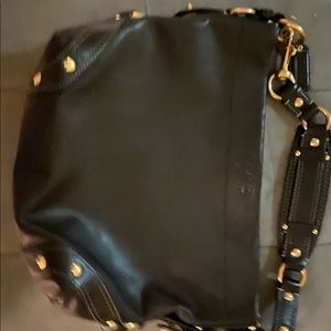 Coach Carly in Black leather